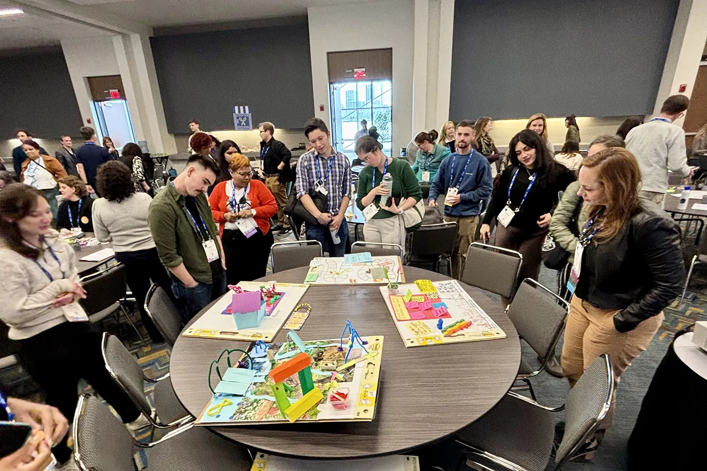 At the end of the activity, participants moved around the room’s “resilience gallery” to look at other team’s creations.