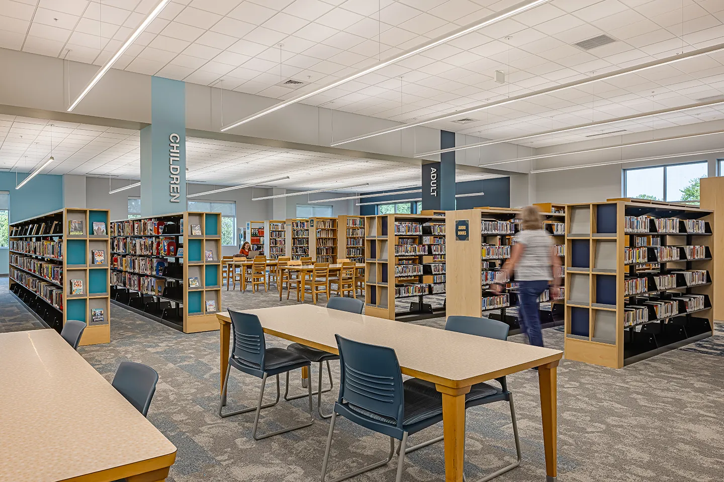 We chose an open-concept design for the Evans Public Library, with sections distinguished by light blue paint in the kids section and dark blue paint in the adult section.