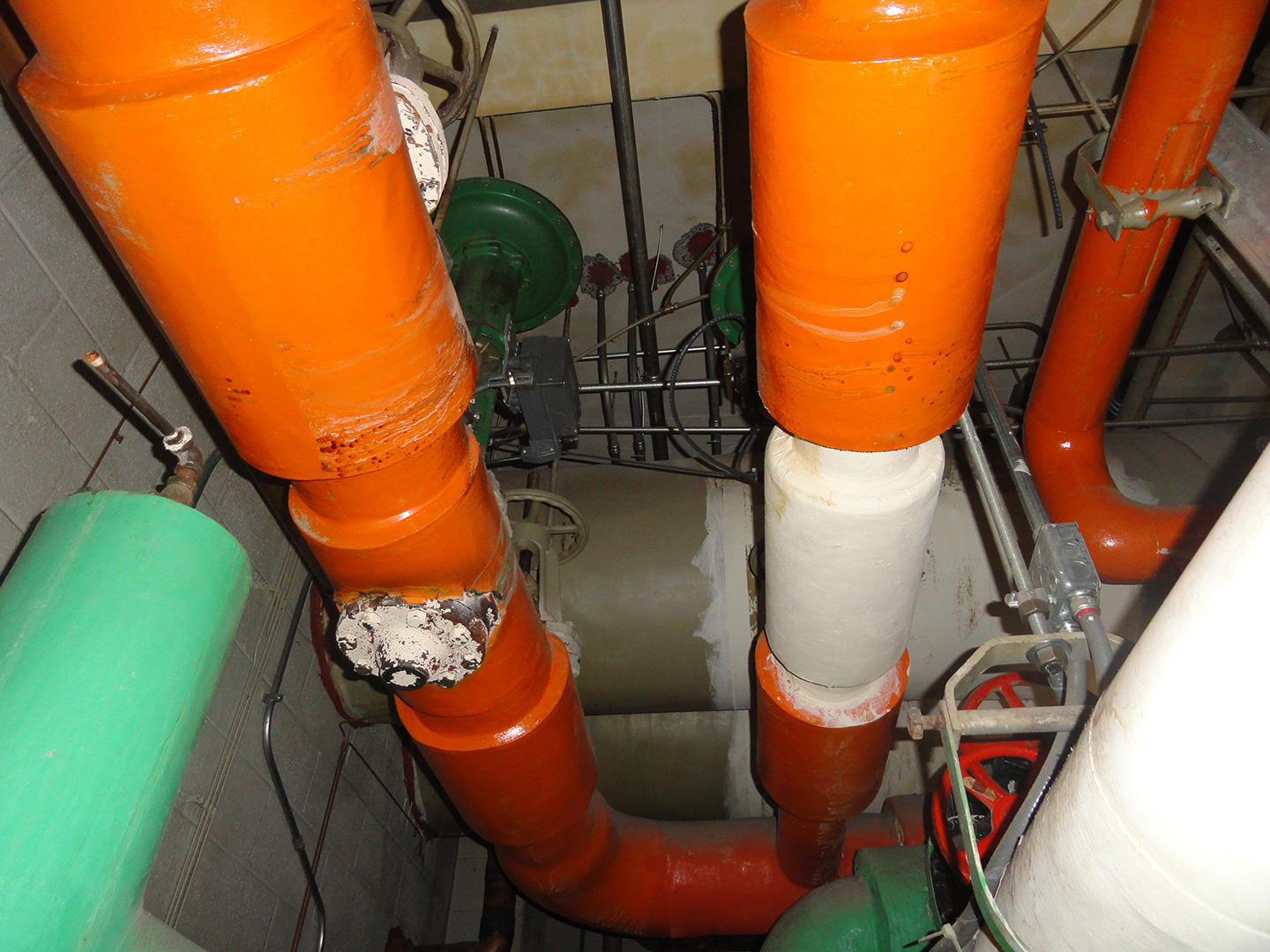 Hydronic piping and valves from a 1960s hospital tower