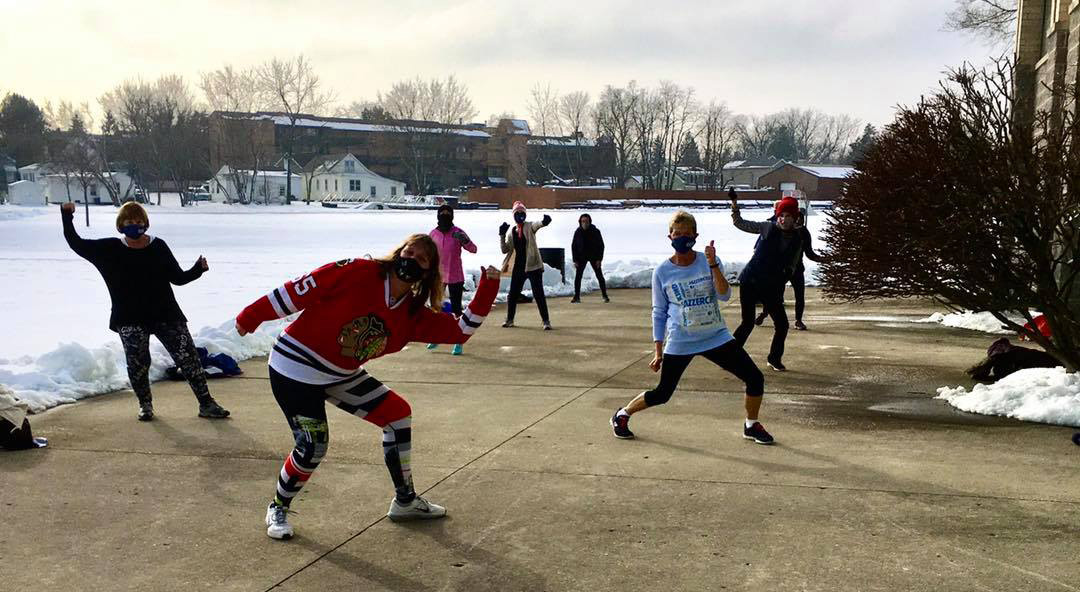 This Jazzercise® class meets outside unless the temperature drops below 26 degrees or if the snow isn’t removed from the patio. Photo courtesy of the Wauconda Park District.
