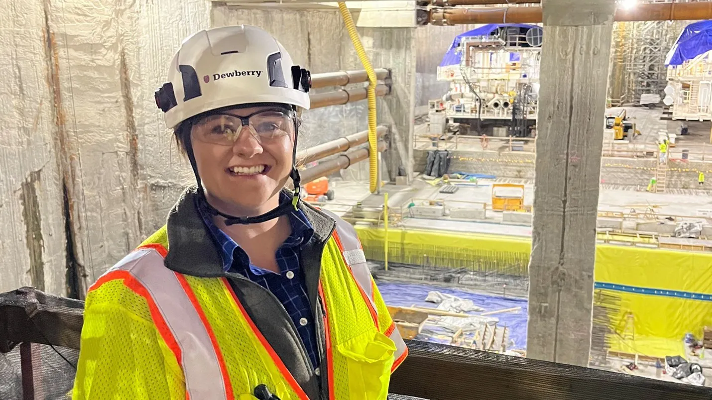 Health, Safety, and Environment Manager Elaine Browning wears personal protective equipment (PPE) at a job site.