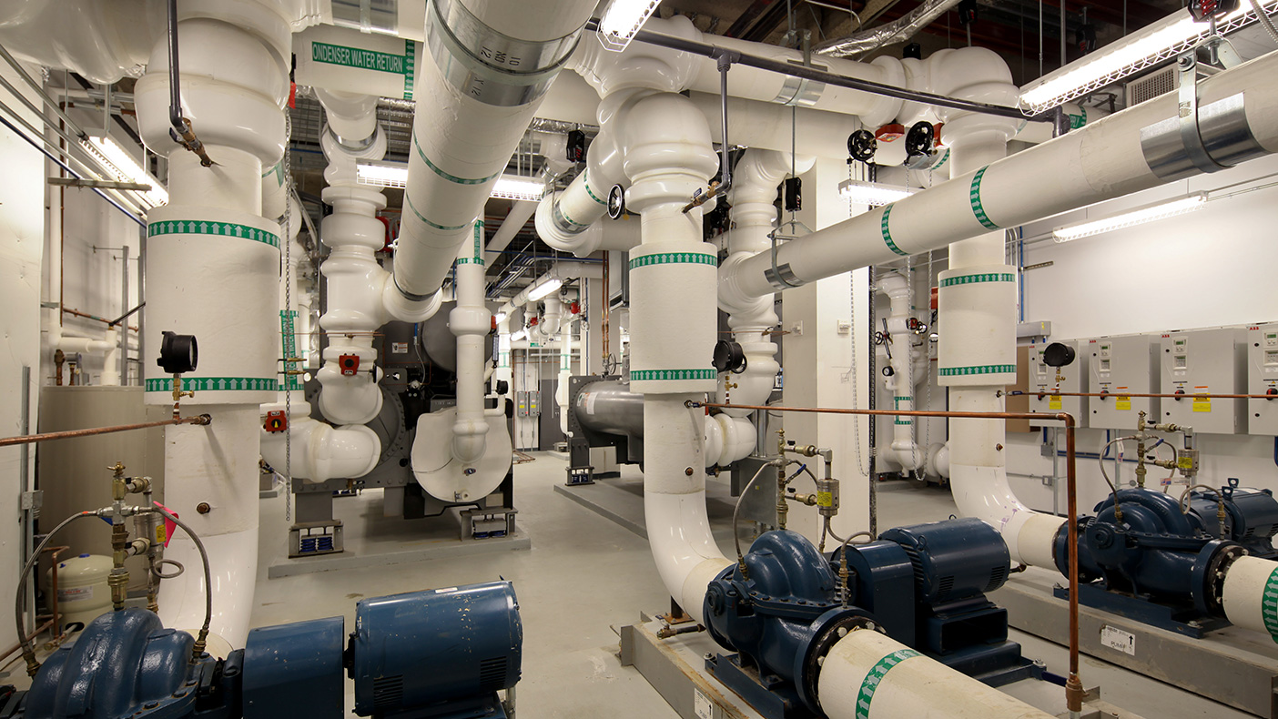 The mechanical system replacement included new chilled water and condenser water pumps in a central chilled water plant using variable speed pumping and low-temperature, wide-differential designs.