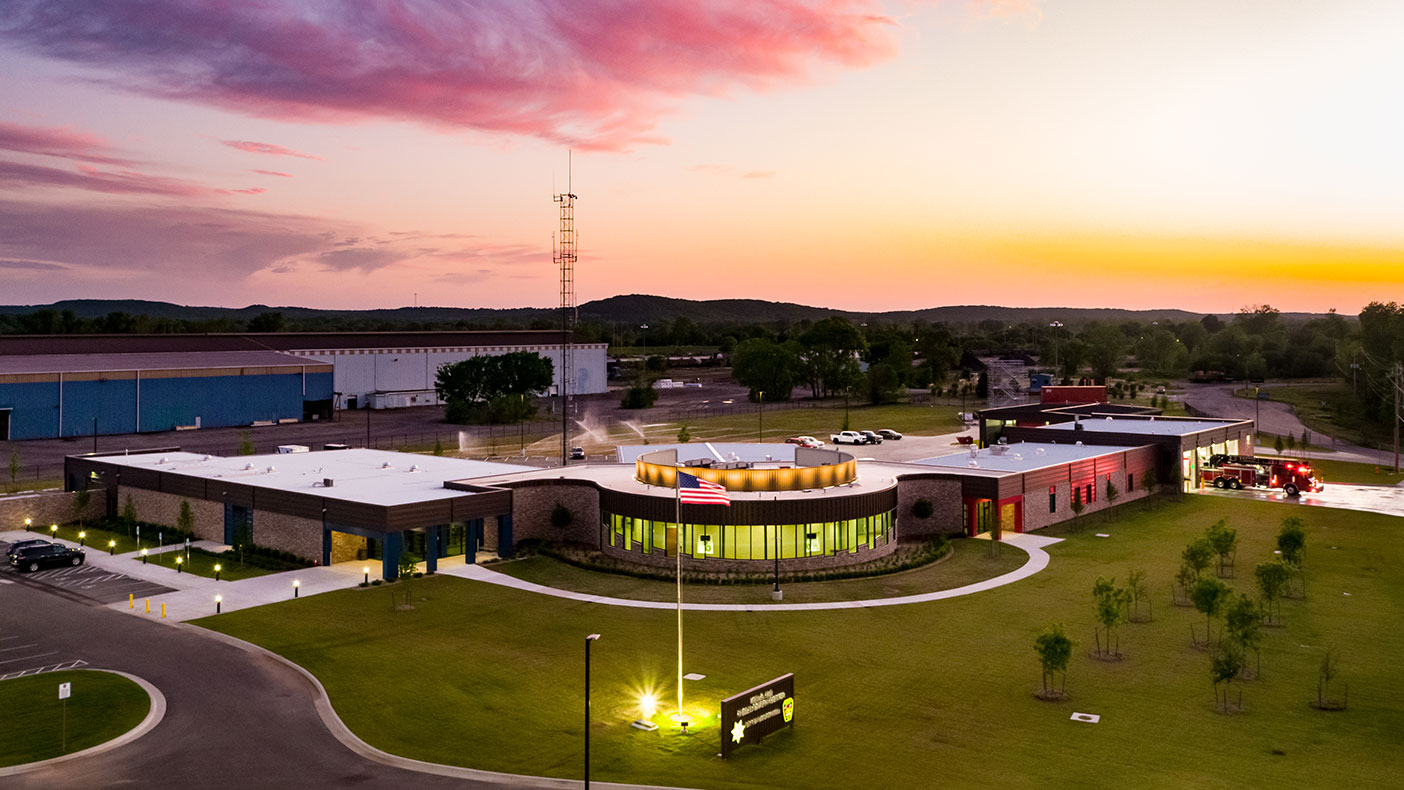 The new public safety center in Sand Springs brings police, fire, court, and emergency services together in one location. The “wagon wheel” floorplan places the courtroom at the hub with other services radiating outward in three light-filled wings.
