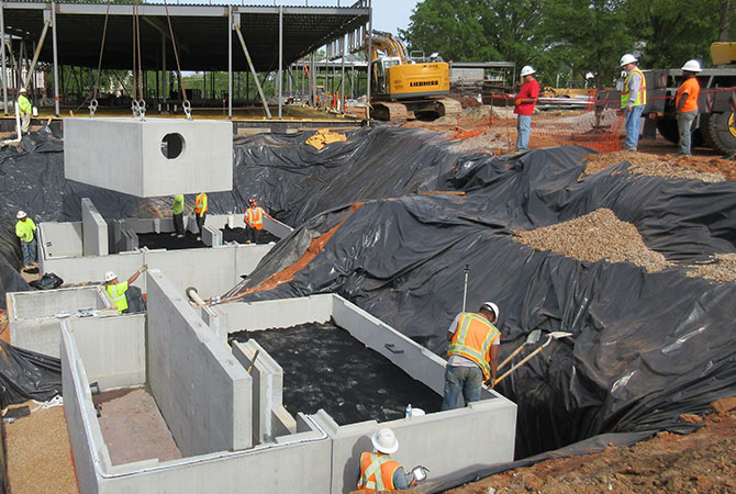 Our stormwater design uses two sand filter structures that are buried on the site to treat for nitrogen runoff and filter stormwater underground. 