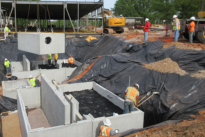 Our stormwater design uses two sand filter structures that are buried on the site to treat for nitrogen runoff and filter stormwater underground.