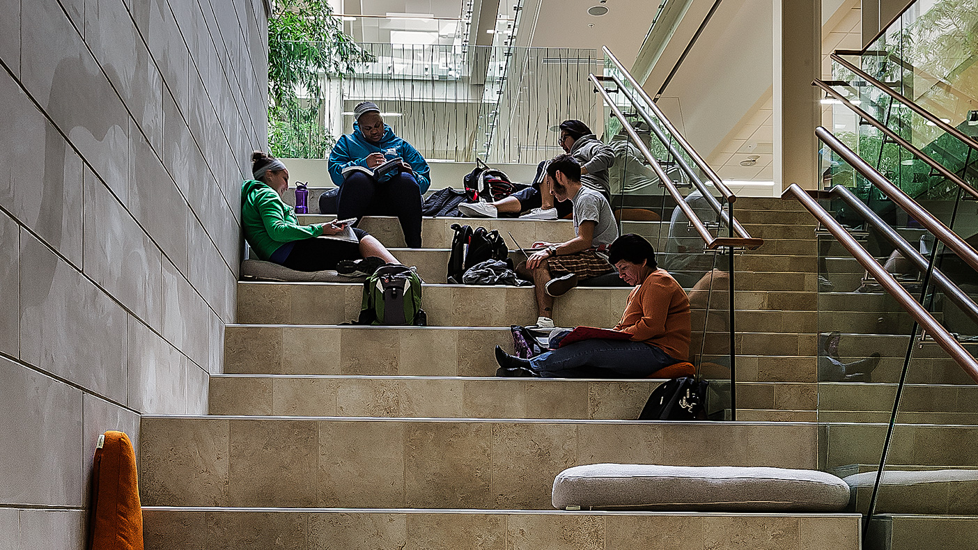 A step-down bleacher area includes pillows and a digital screen at the bottom for informal meetings and presentations (photo courtesy Mark Ballogg).