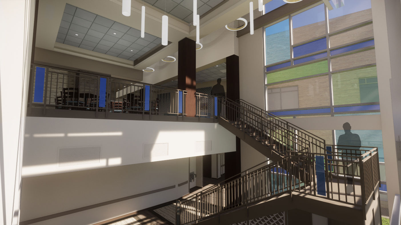 The open staircase provides a visual connection between the lower and upper levels with the full height windows taking advantage of the park views. 