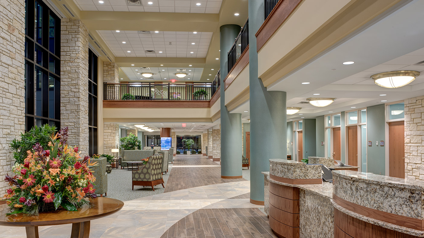 The expansive new two-story lobby provides a grand entrance and creates a central link between the new and existing areas.  It features intimate gathering spaces that are enhanced by natural light.