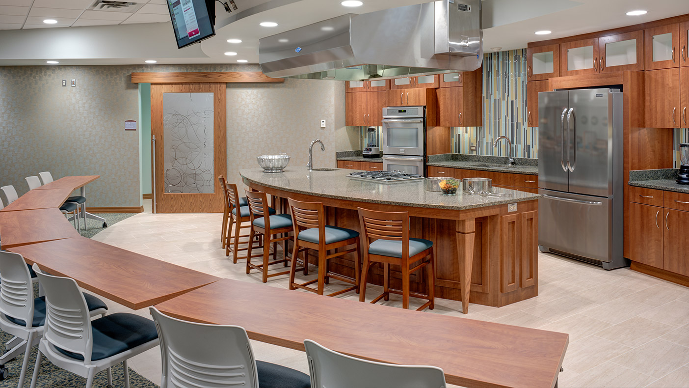  An important part of holistic cancer care, nutrition education is conducted in a demonstration kitchen where experts share their healthy cooking techniques and menu planning.