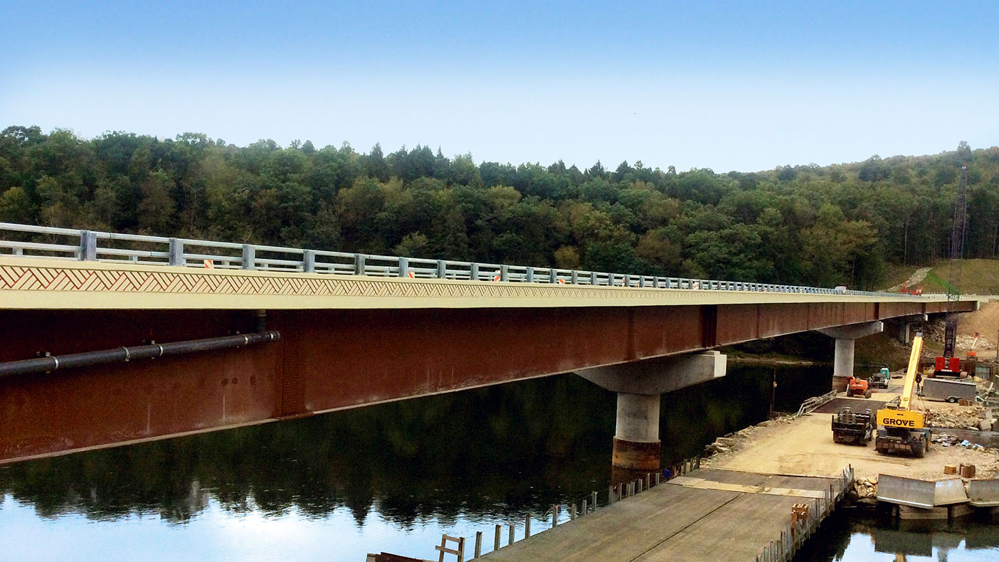 A causeway system between the new and original bridge was utilized for both demolition and construction work.