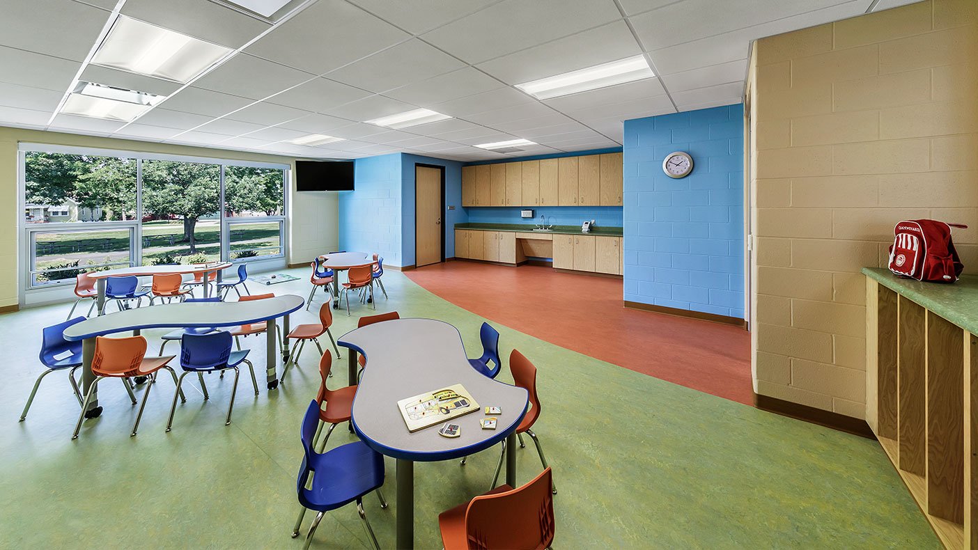 The center features three preschool classrooms, a multipurpose space, a kitchen, and an administrative space.