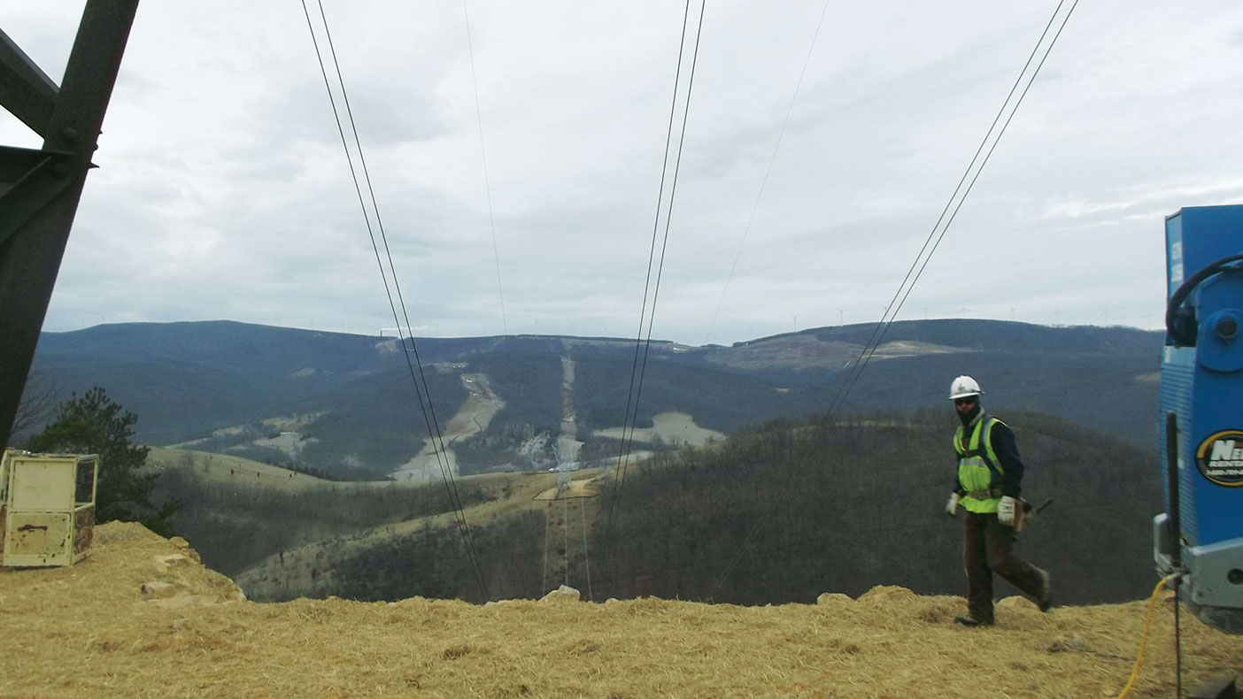 The transmission line ran across mountains, valleys, and other steep elevations, which posed difficult barriers to the line’s refurbishing.