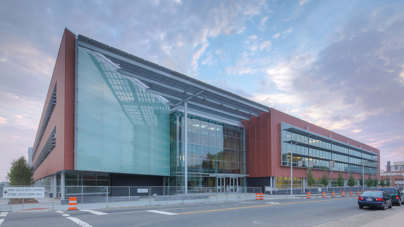 The design includes clerestory roofs and a terra cotta panel exterior. 