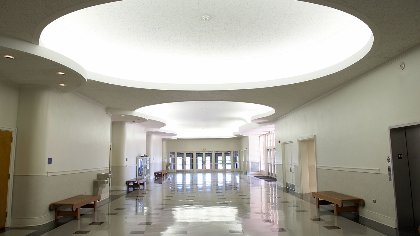 The lobby was restored to its original condition, including the elaborate ceiling.