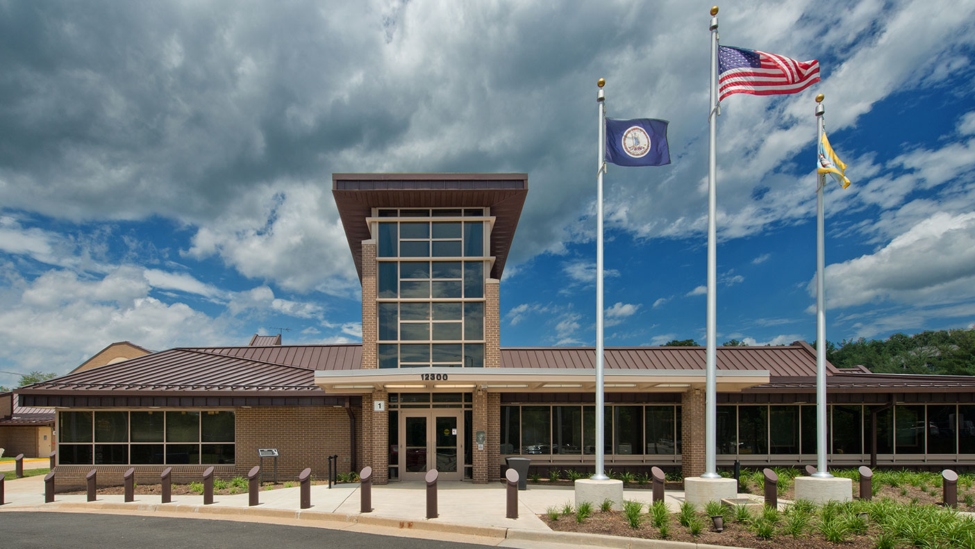 We created several additions to transform the exterior of this aging building into one unified structure with an identifiable entry.