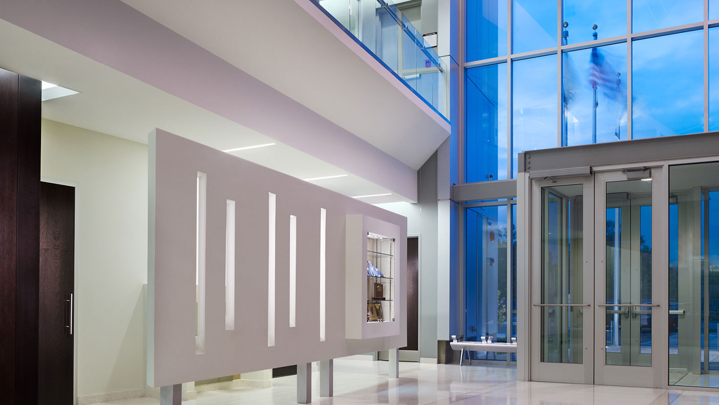 We incorporated large amounts of glass in the lobby and community room to create an inviting atmosphere, as well as increase safety at night.