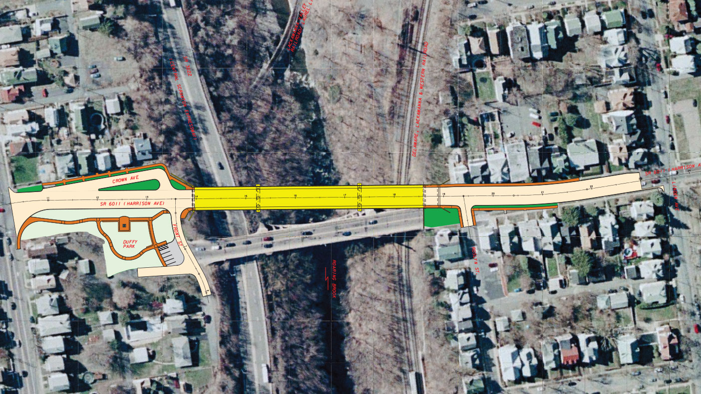 In this aerial view of the Harrison Avenue Bridge plan, each aspect of the project, the bridge, roads, and neighboring Duffy Park can be seen.