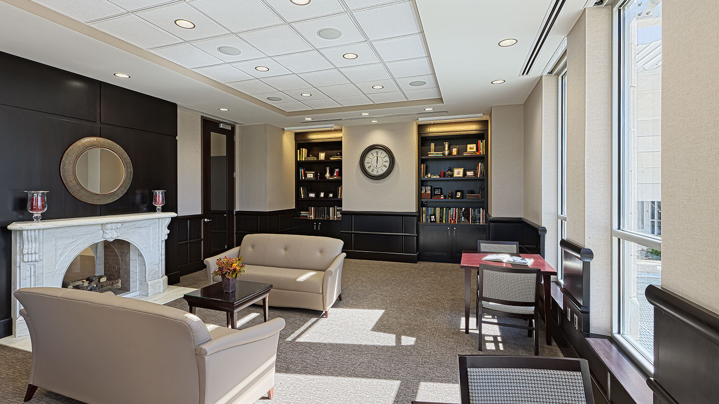 The two-sided marble fireplace, a replica of the one in founder Lydia Moss Bradley's home, opens into the Hall of Pride and the center’s main-floor library.