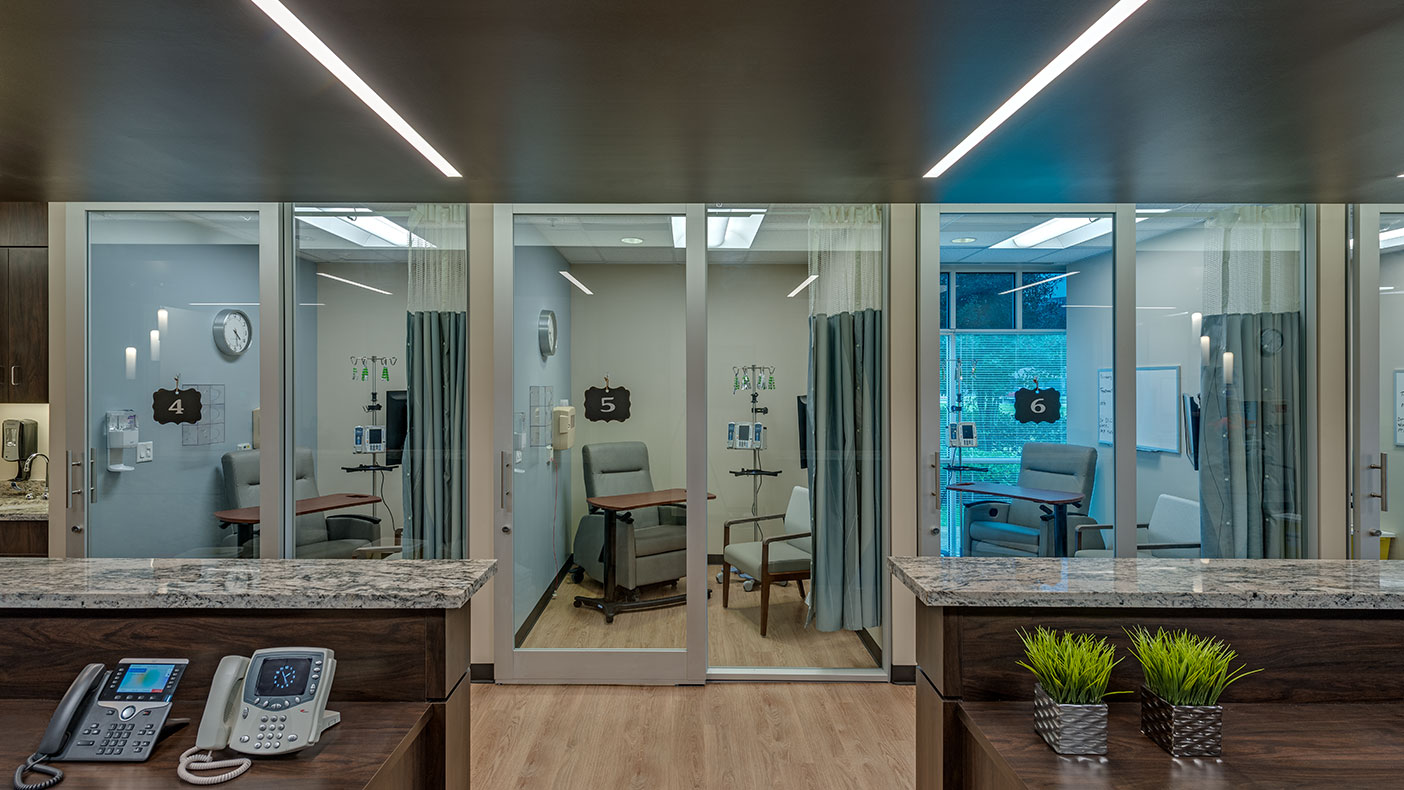 Patient treatment bays offer acoustic and visual privacy.