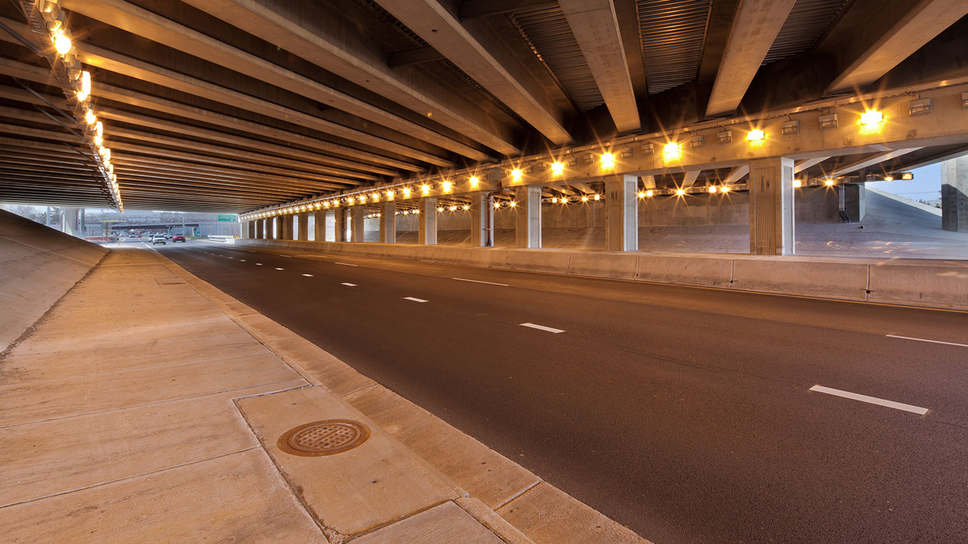 Existing 1-95/1-495 mainline bridges, which did not meet vertical clearance requirements and had been damaged by truck impacts over the years, were raised by as much as five feet.