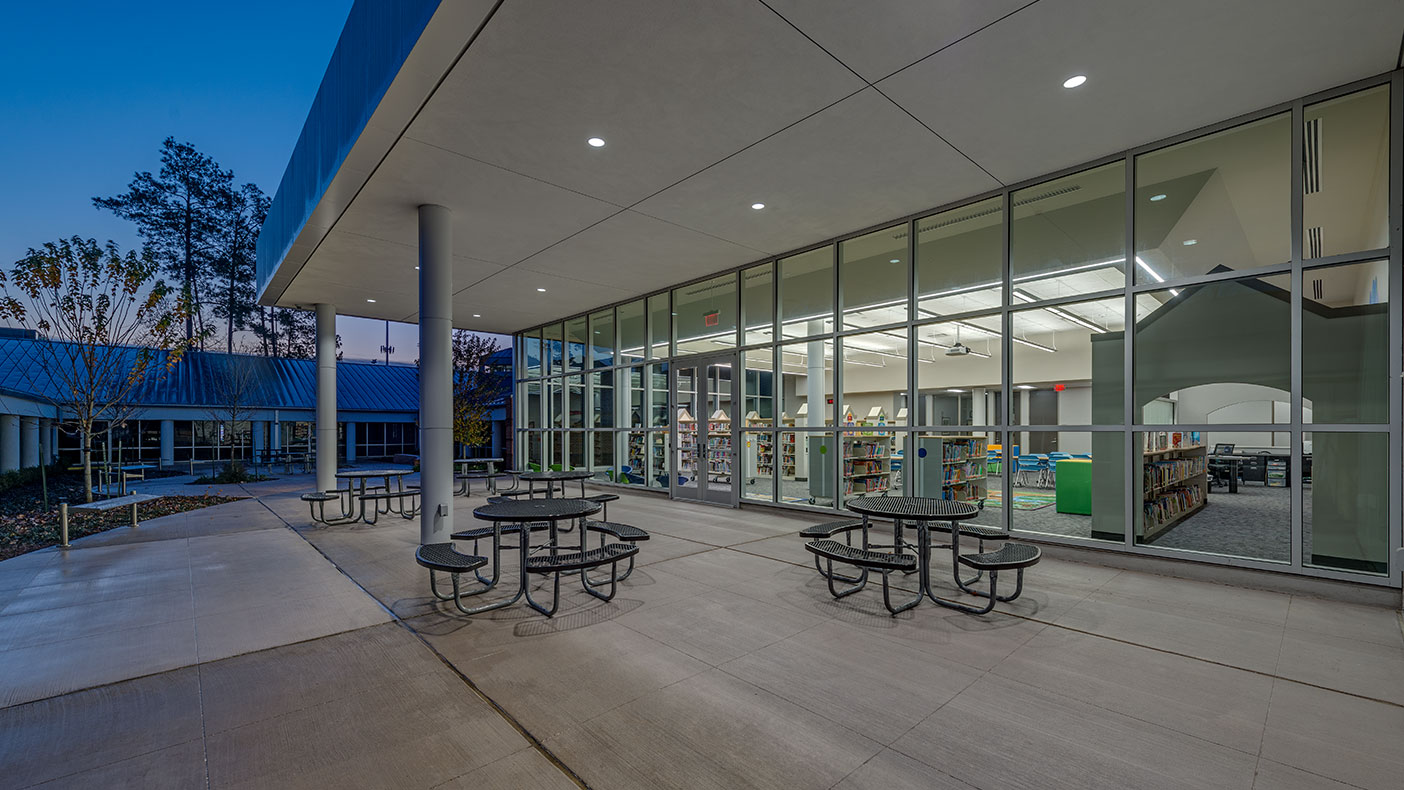 The design incorporated an outside space that is protected by the roof overhang giving the students and their teachers an outdoor space for learning.