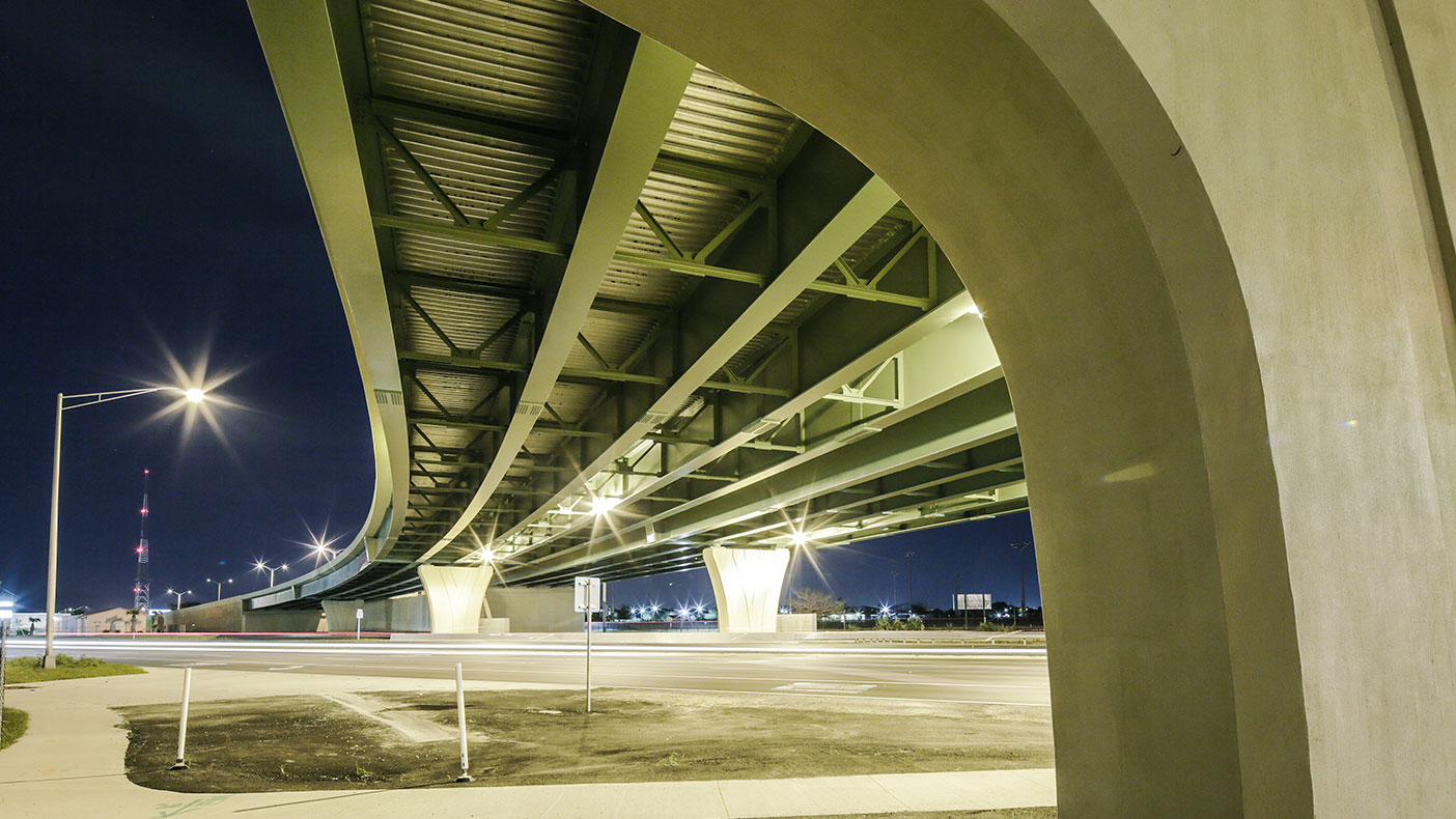 The project included noise and retaining walls, signing and pavement markings, lighting, and sidewalks.