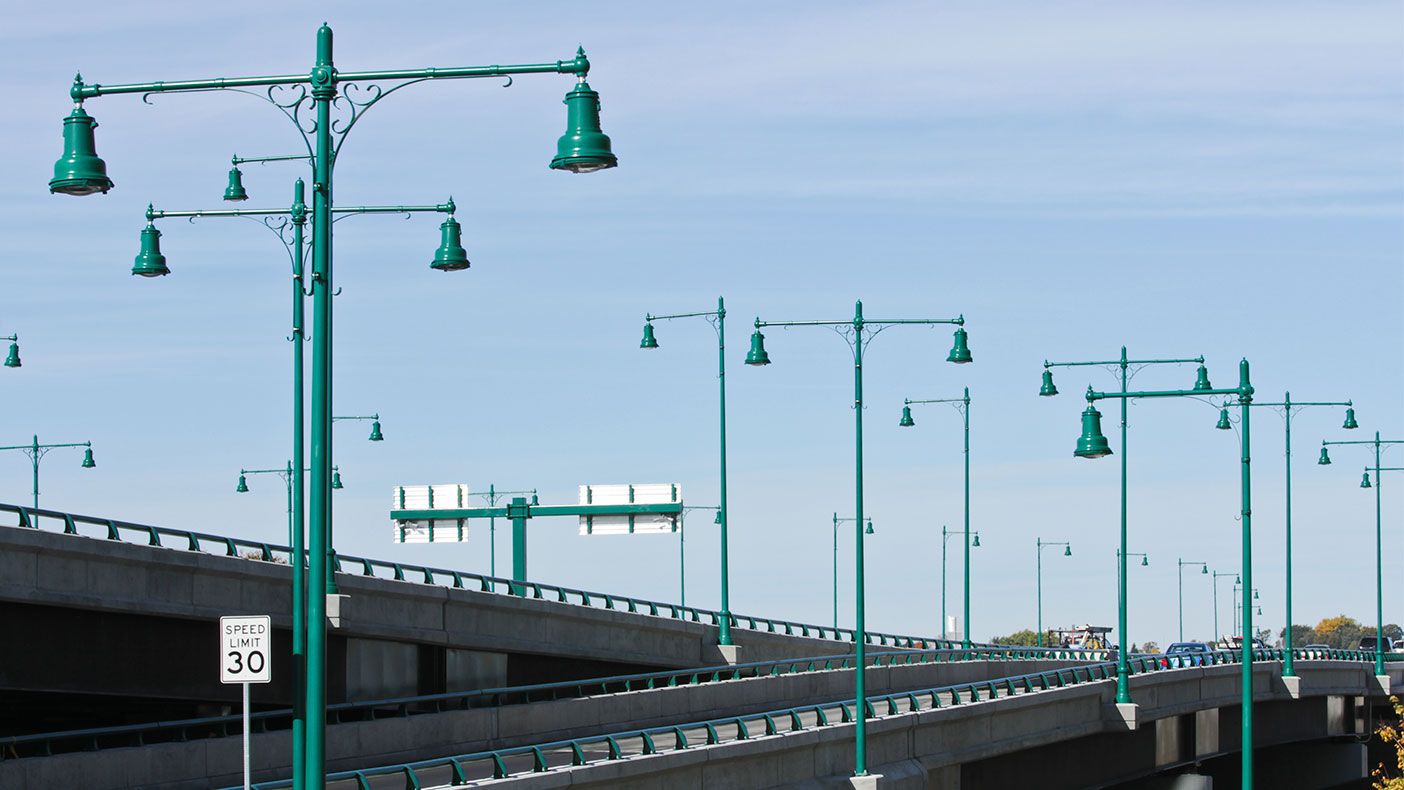 Aesthetic improvements included site specific lighting fixtures and railings to visually connect the bridge to the adjacent Quincy Shore Drive parkway environment. 