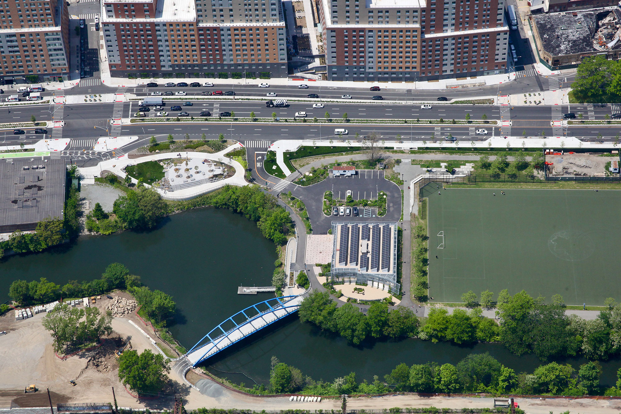 Aerial view of the Sheridan Blvd. From 172nd Street (left side of the picture) to 173rd Street. The NYSDOT designed pedestrian bridge is shown in the foreground.  Photo courtesy of AECOM/Dewberry JV.