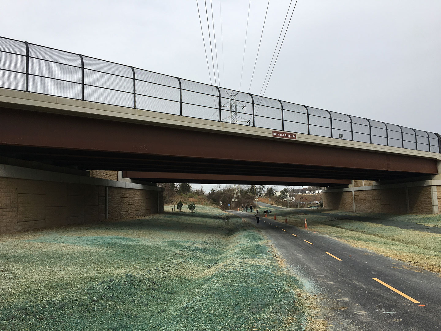 New parallel bridges carry Belmont Ridge Road over the W&OD Trail.  Photo courtesy of Dewberry.