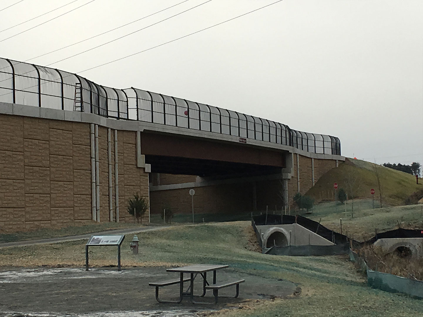 A new parking lot provides the trail with a rest area that includes picnic benches and landscaping. Photo courtesy of Dewberry.