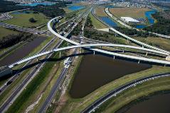 The project included three post-tensioned curved concrete U-beam bridges, the first of their kind in Florida, and a curved steel bridge.