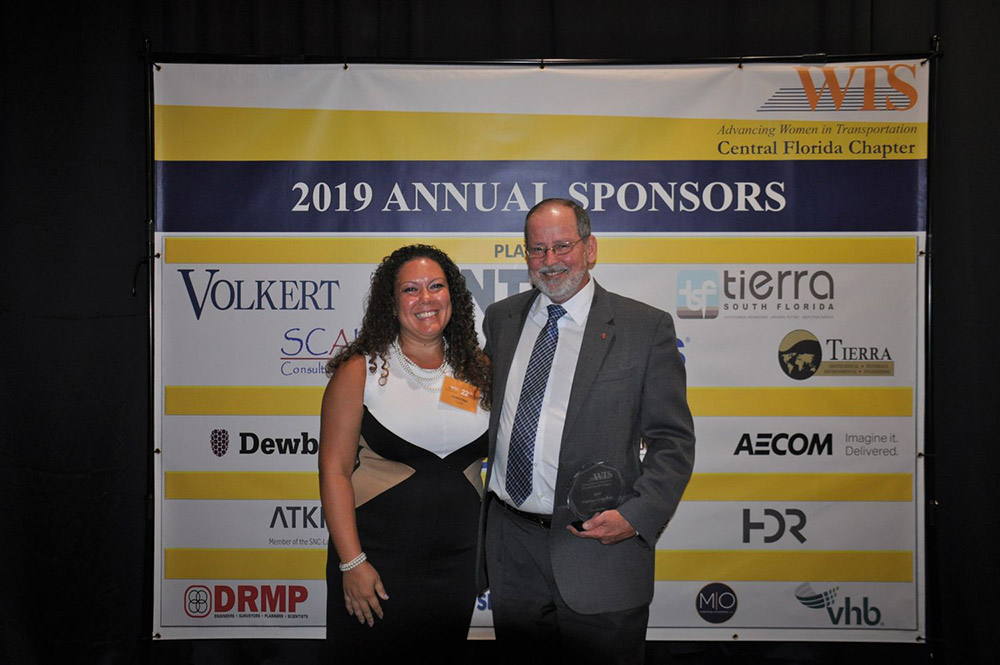 Kevin Knudsen with WTS Central Florida Chapter President Christina Colon.  Photos courtesy of WTS.