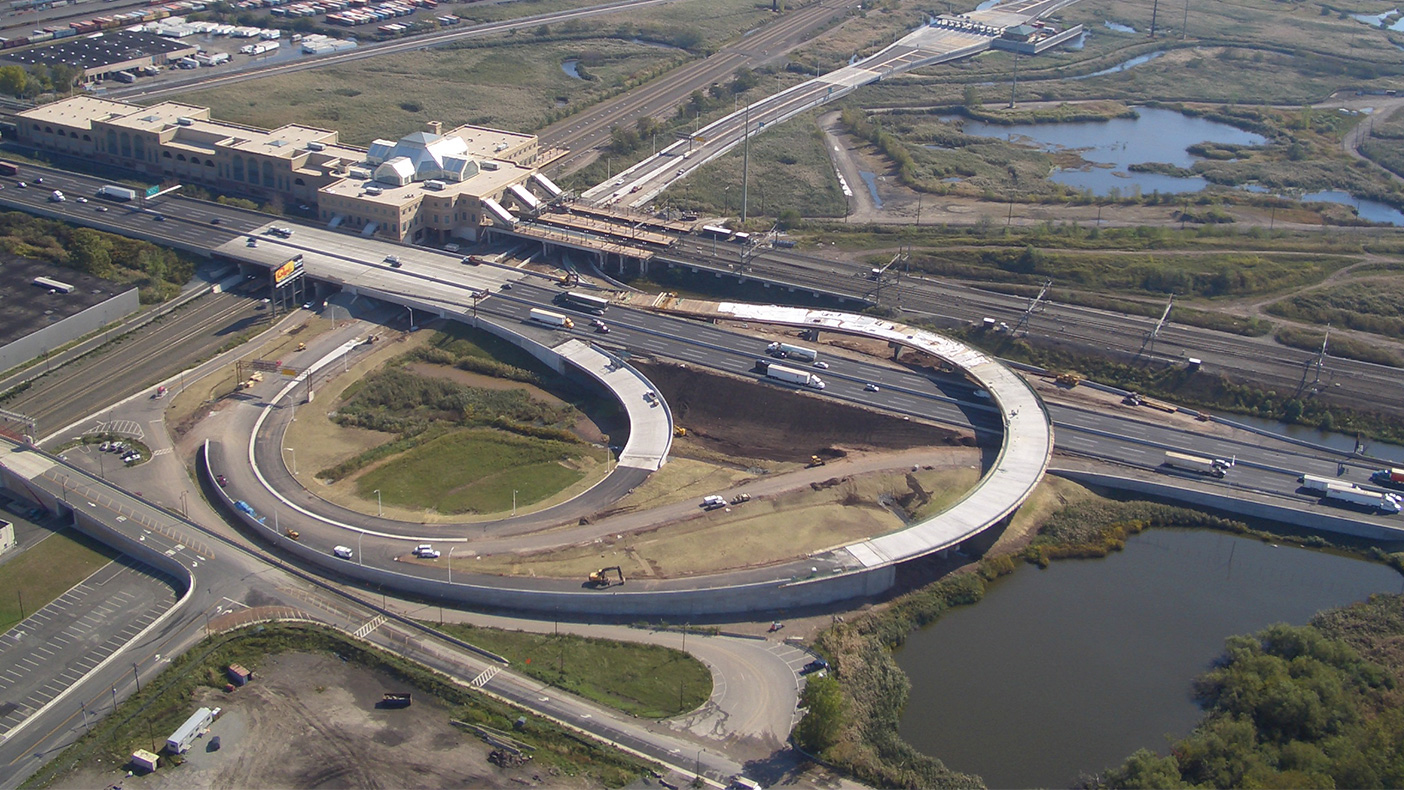 We designed ramps to fit under an existing Amtrak rail bridge and between tightly spaced piers. We widened and redecked a bridge over NJ Transit tracks and a passenger platform while the facilities remained open.