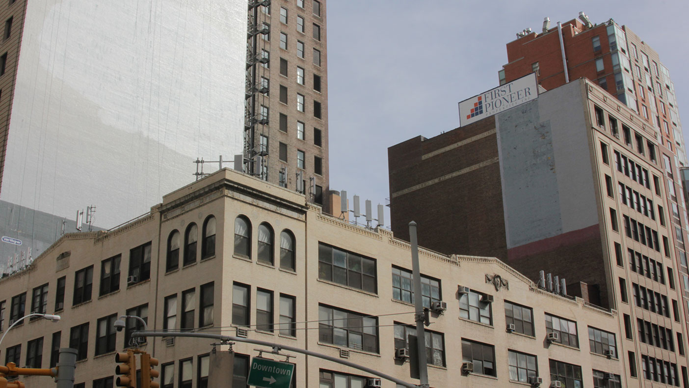 The new antennas were designed to extend no higher than six feet above the existing parapet so that architectural sight lines remained relatively unaltered.