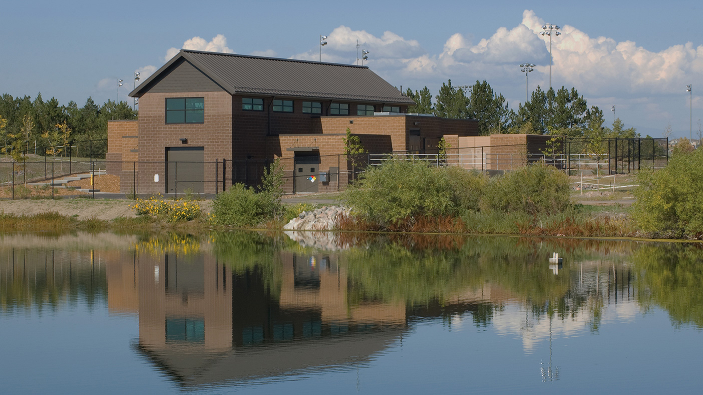 Designed to blend into the local environment, the facility is situated in an equestrian park adjacent to a major recreational pathway and baseball fields.