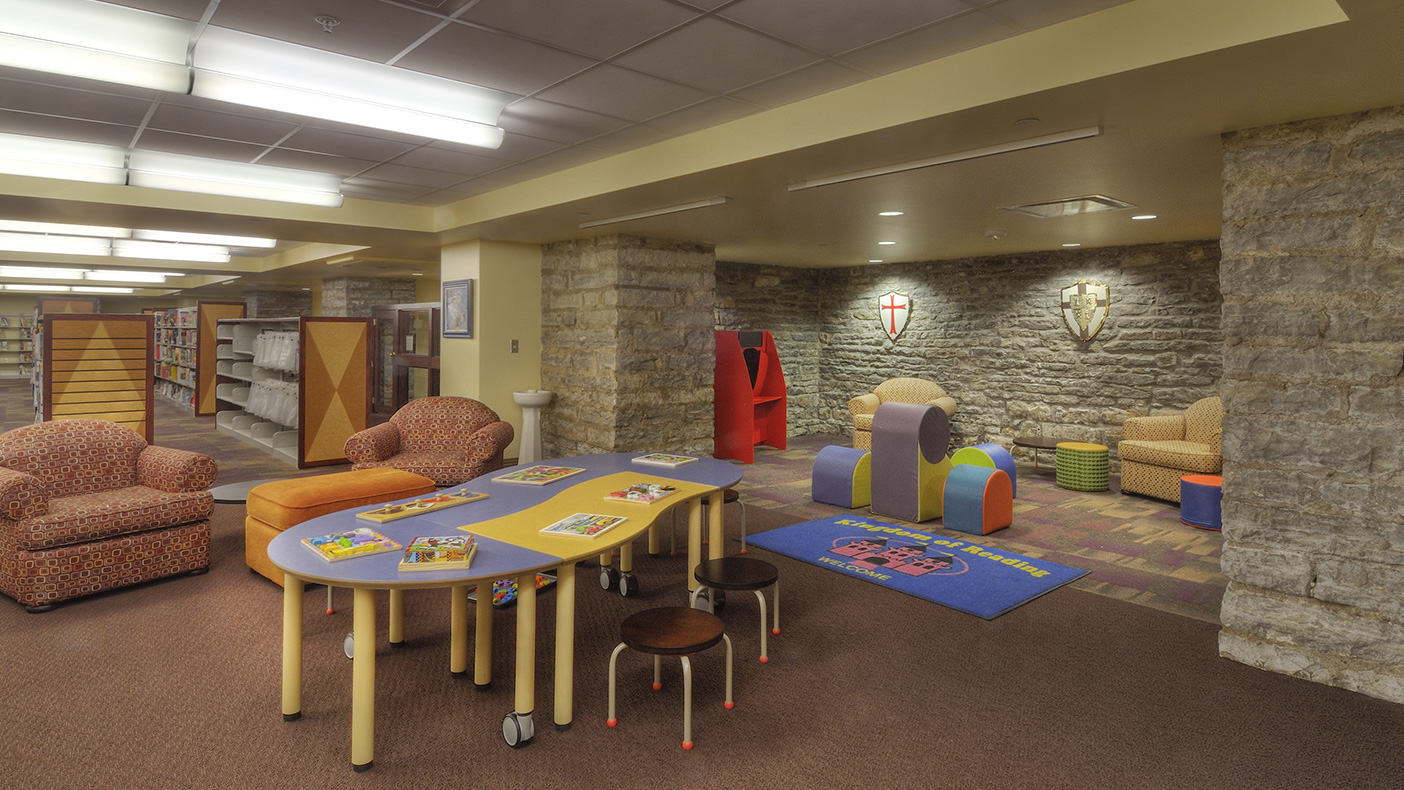 The existing stacked stone walls helped create a castle-like feel on the lower level, creating a welcoming children’s area.