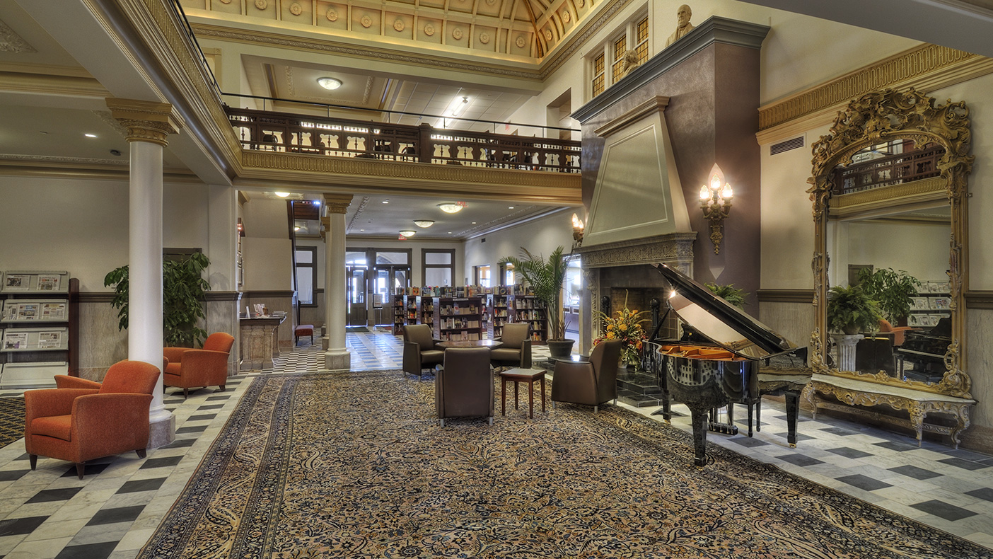 The hotel’s dramatic main lobby has been recast as a grand yet comfortable and light-filled reading area surrounded by adult collections.