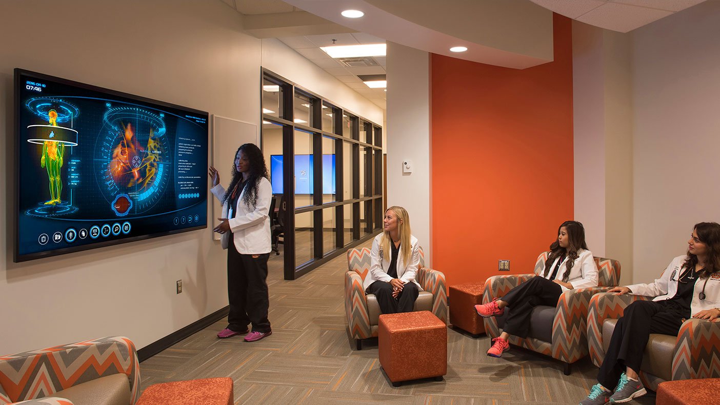Student support areas, such as this stand up conferencing space, are designed as technology enriched teaching and learning spaces that enhance group dynamics.
