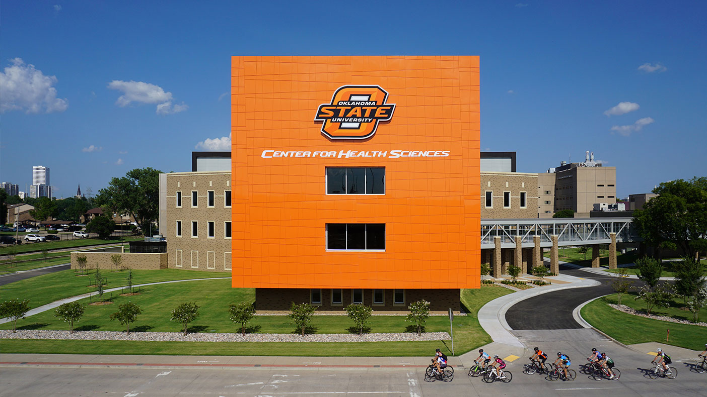 The four-story exterior features a bright-orange skin designed to help OSU-CHS establish its presence and brand along US-75.