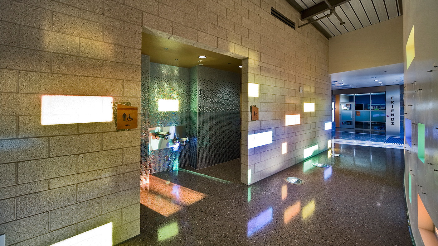 Facing south, design of the entrance lobby, which leads to community meeting rooms, uses the strong Arizona sun to create interesting patterns within this traditional space.