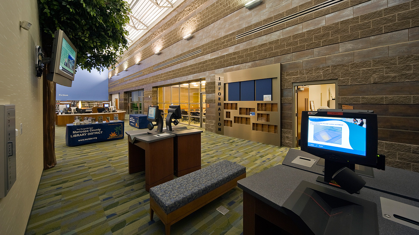 The library uses a complete self-service check-in/check-out system with RFID sorting.