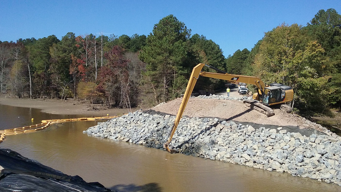 Phase II plans included traffic and erosion control, utility relocation, stormwater management, and structure and roadway plans, and permit drawings.