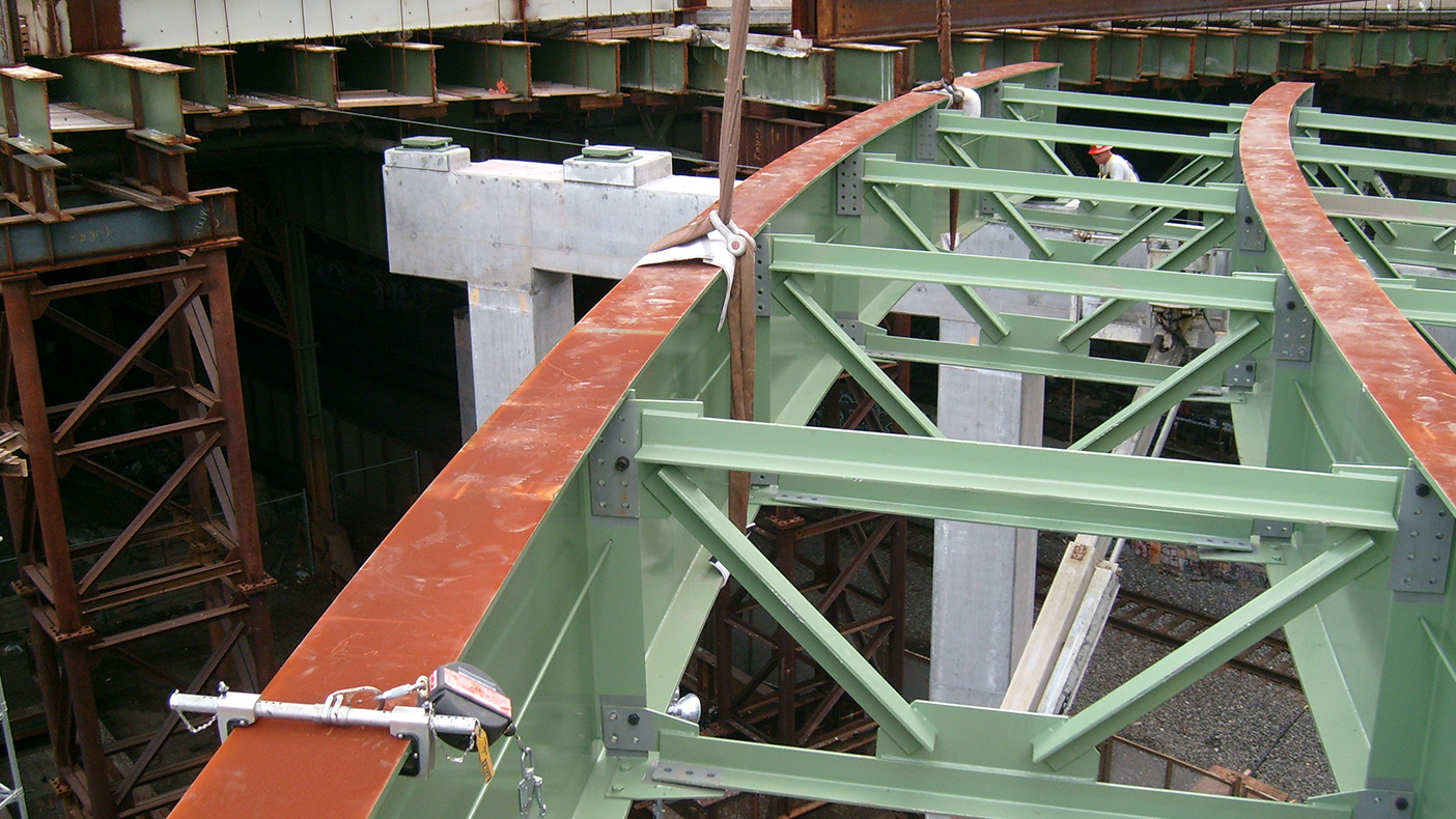 A section of the Miller Highway Tunnel concrete shell was constructed from West 61st to West 64th Streets and 3.5-foot-thick concrete relieving platforms on H-piles were constructed to accommodate 25-foot-high embankment construction.