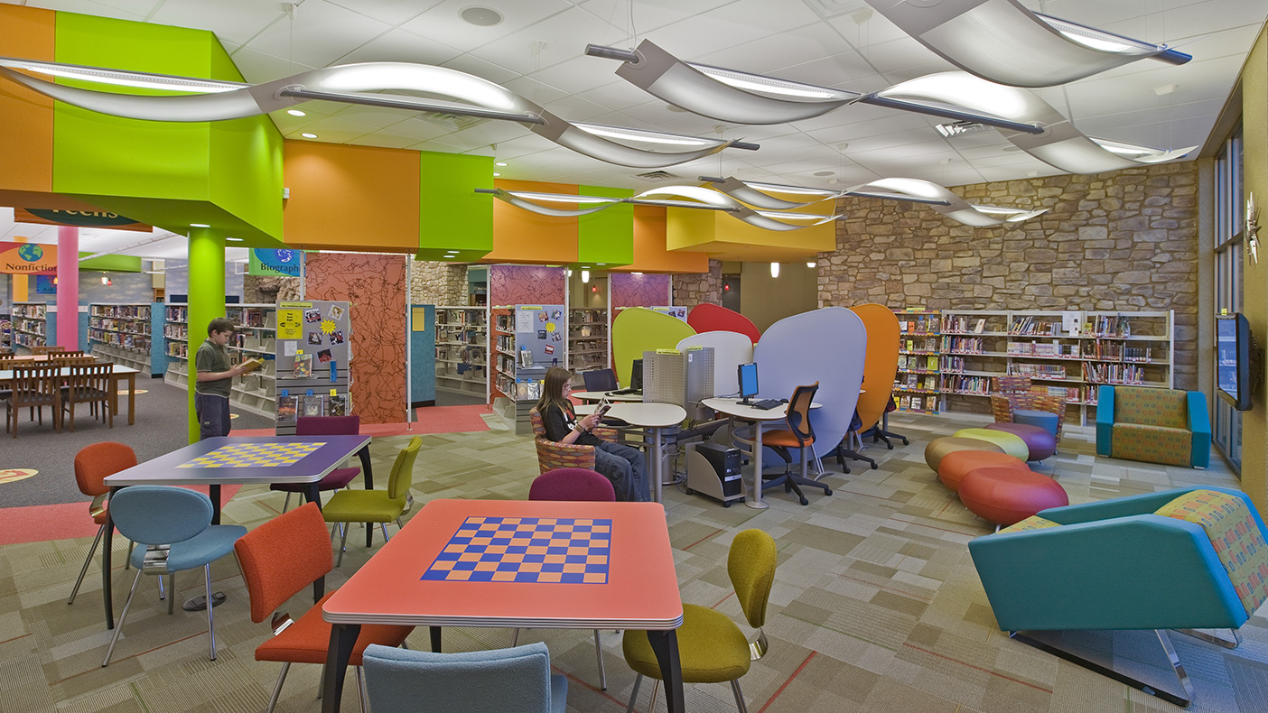 The new 52,000-square-foot Rockwall County Library features engaging interiors and welcoming spaces for the community.