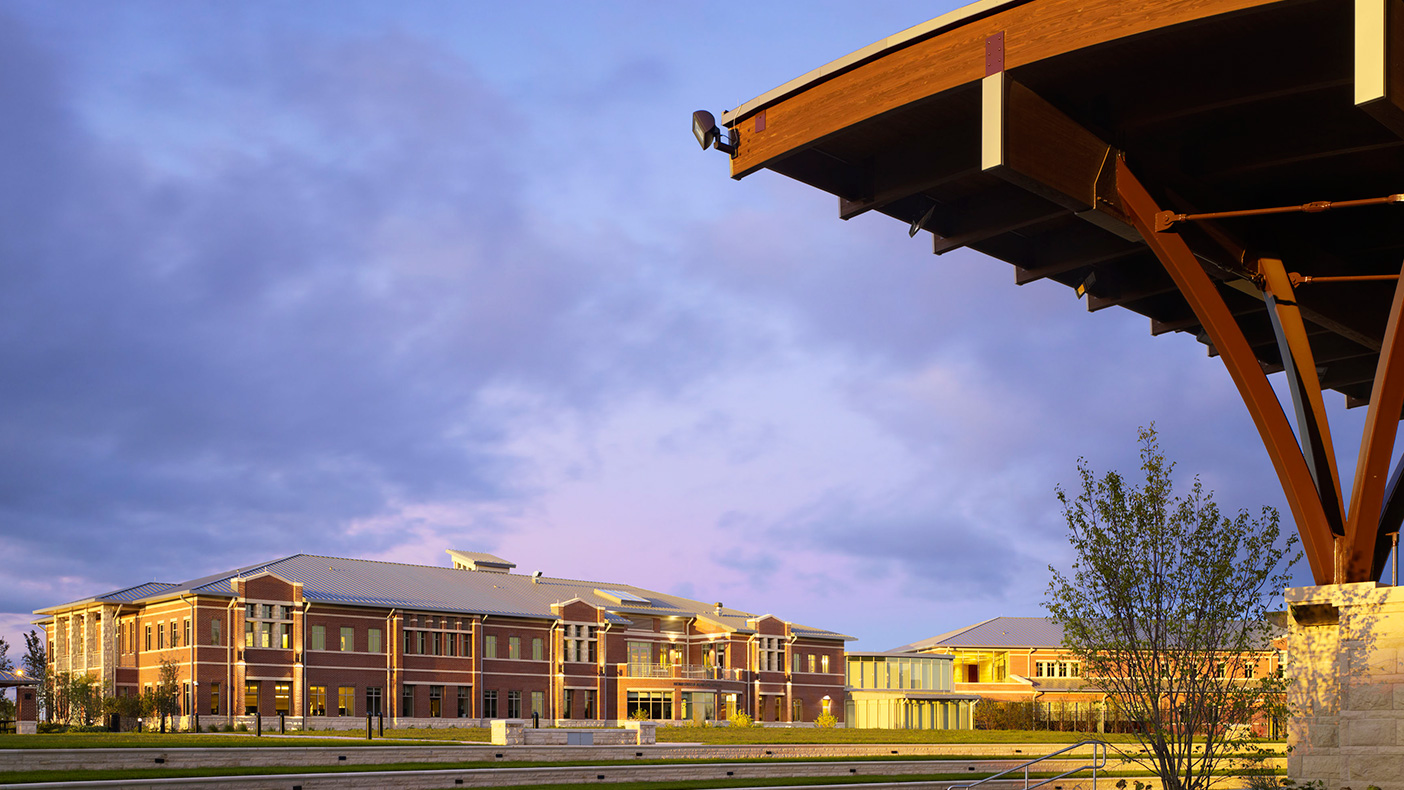 We selected the site for the municipal campus near a wooded area to capture the natural views of the forest from within the building and amphitheater. We also created a main boulevard linking the neighboring residential areas.