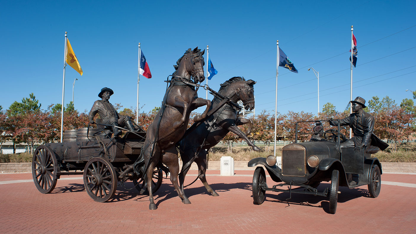 The larger-than-life bronze sculpture is the centerpiece of the Cyrus Avery Centennial Plaza, where kiosks tell the story of Cyrus Avery’s contribution to the road’s development.