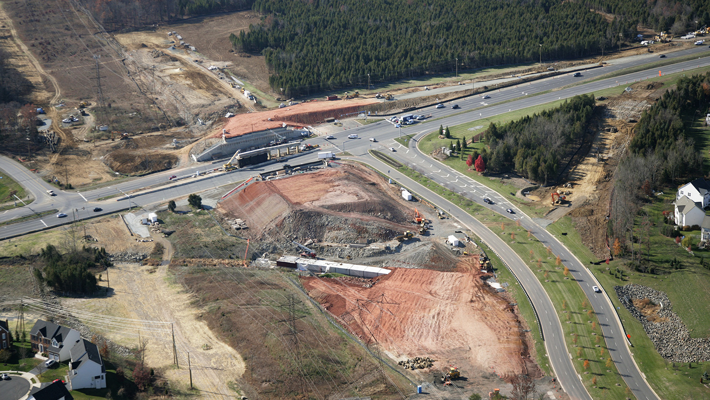 The project included re-alignment and grade separation of River Creek Parkway from its previous at-grade connection with Route 7, the extension of River Creek Parkway south of Route 7, and re-alignment of several connecting roadways.