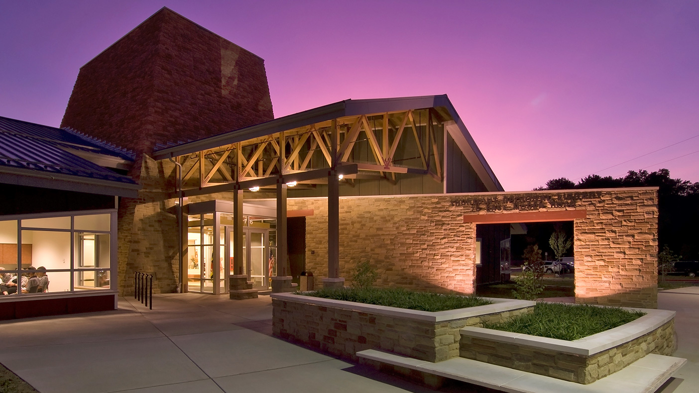 The soaring stone tower forming the library entrance and 40-foot-high centerpiece lobby also serves as exhibition space, used for library functions and community events often held after library hours.