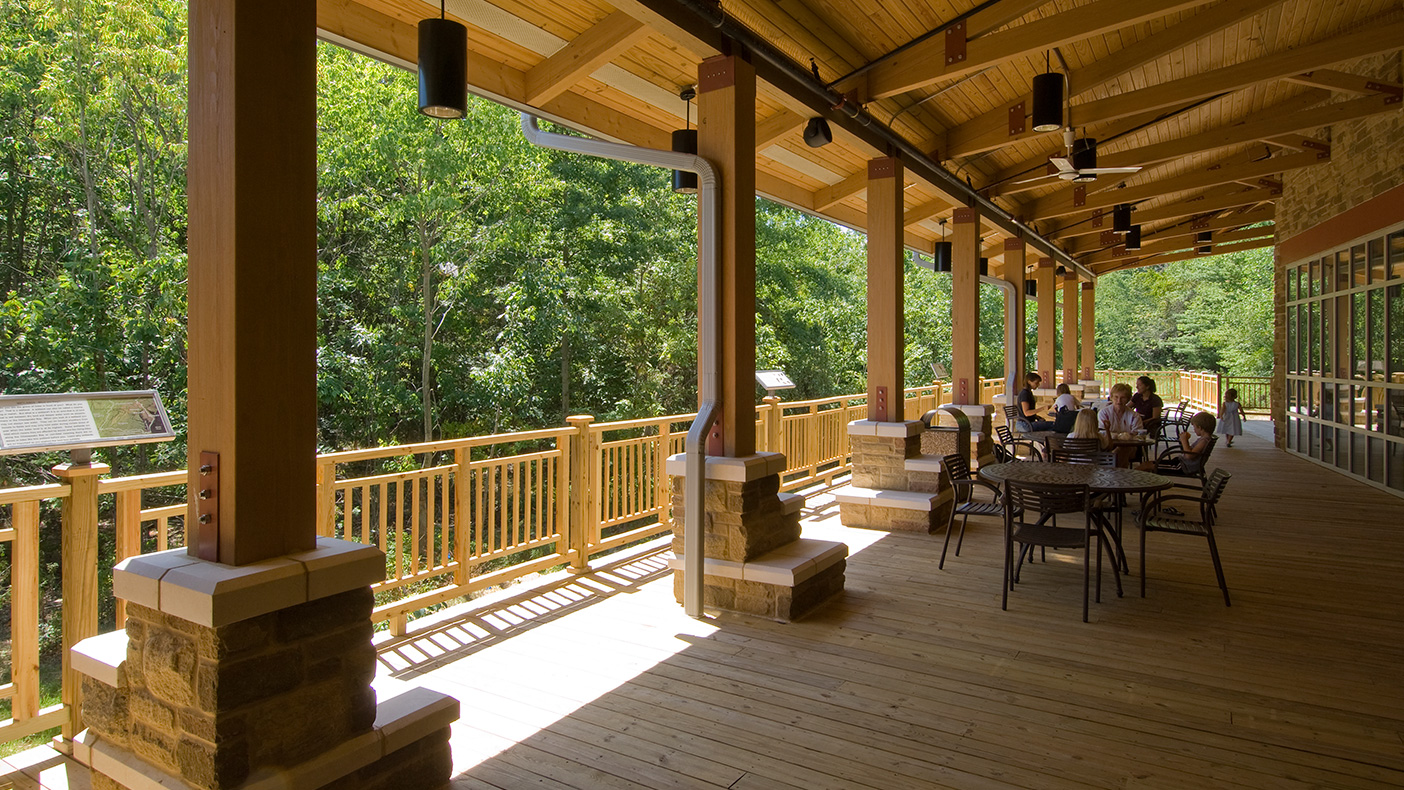 Signage introduces library patrons to the wetland environment and other aspects of the surrounding natural landscape. A popular area for reading in warm weather, the deck is also used for concerts.