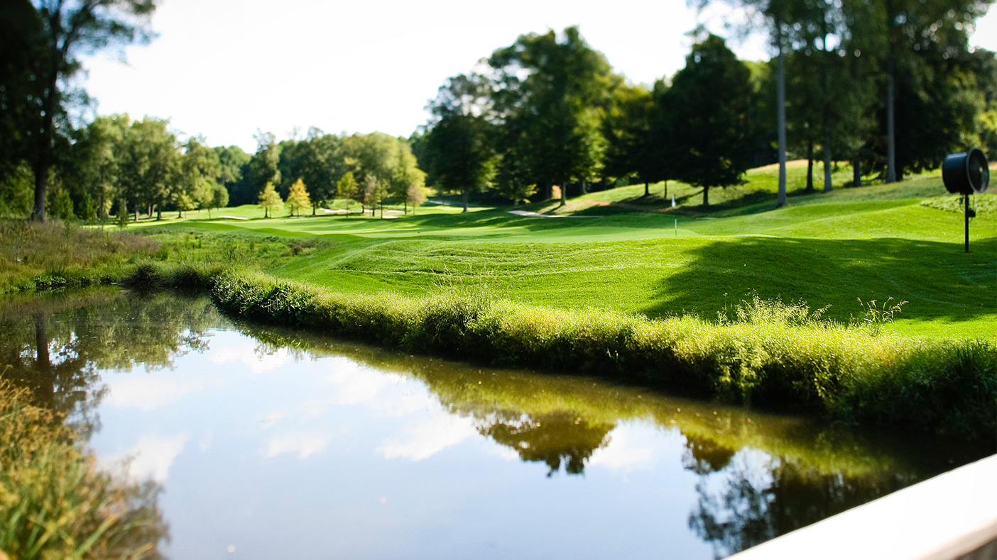 In addition to the stream restoration, 12 acres of new wetlands buffer the course and enhance drainage, with stormwater entering the marsh rather than submerging the course.